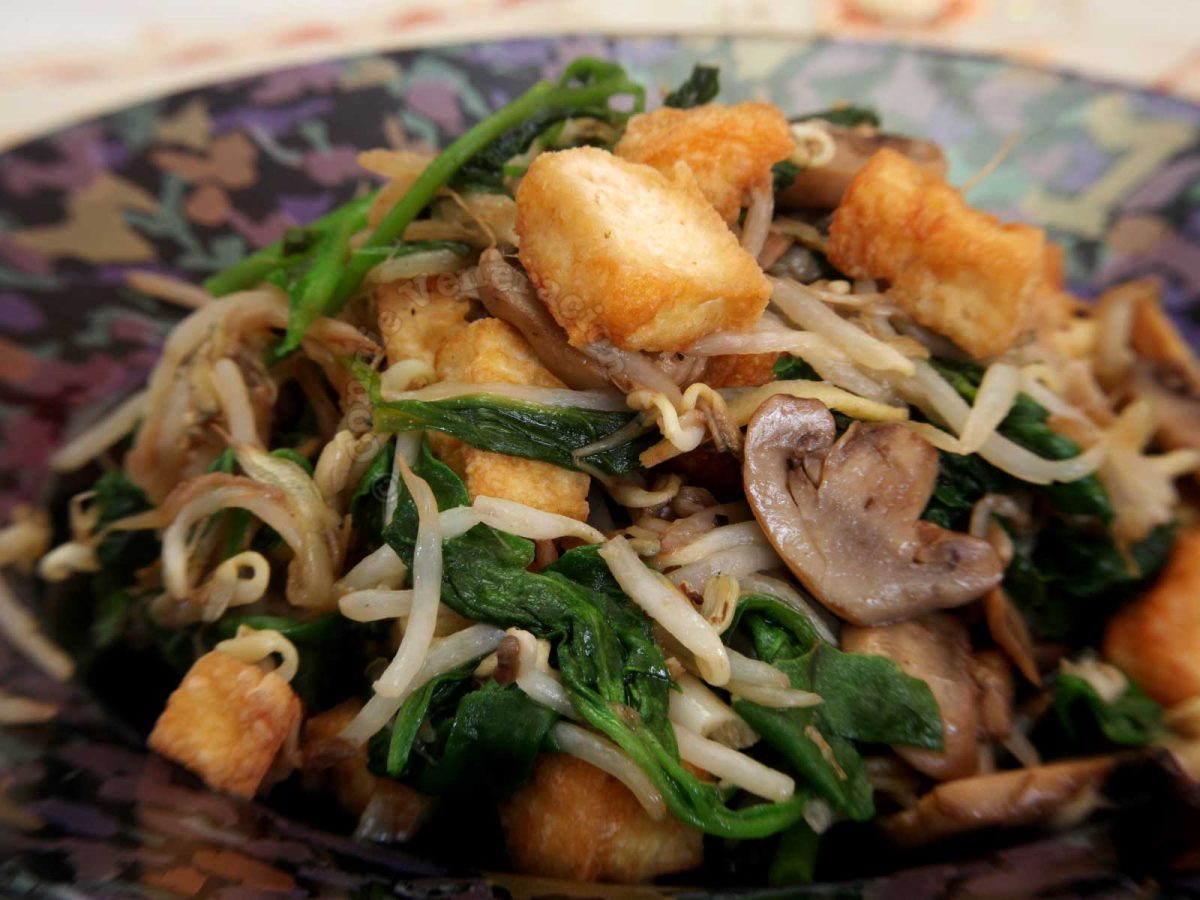 Stir Fried Tofu, Mushrooms, Bean Sprouts and Spinach in Black Bowl